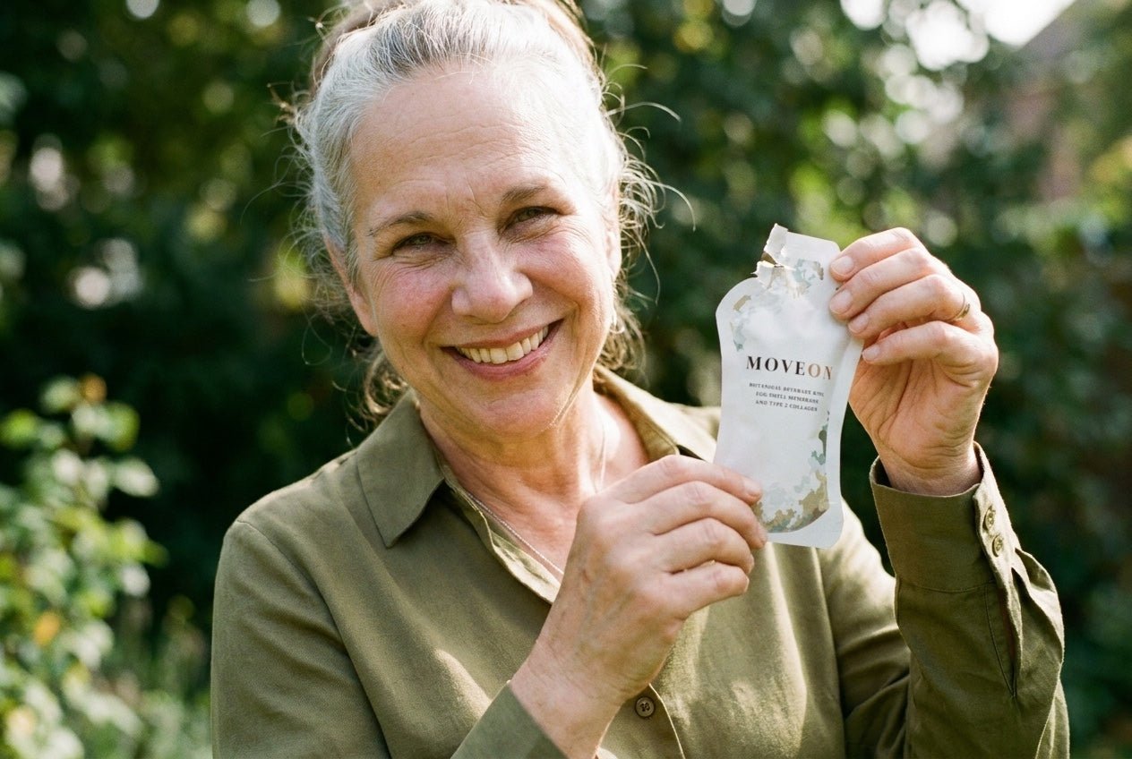 Woman holding a MoveOn sachet